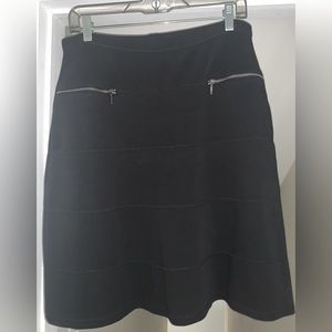 Athleta Lady’s Black A-line skirt:  Size Tall Medium